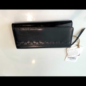 New with tags black leather Hobo tri-fold magnetic wallet